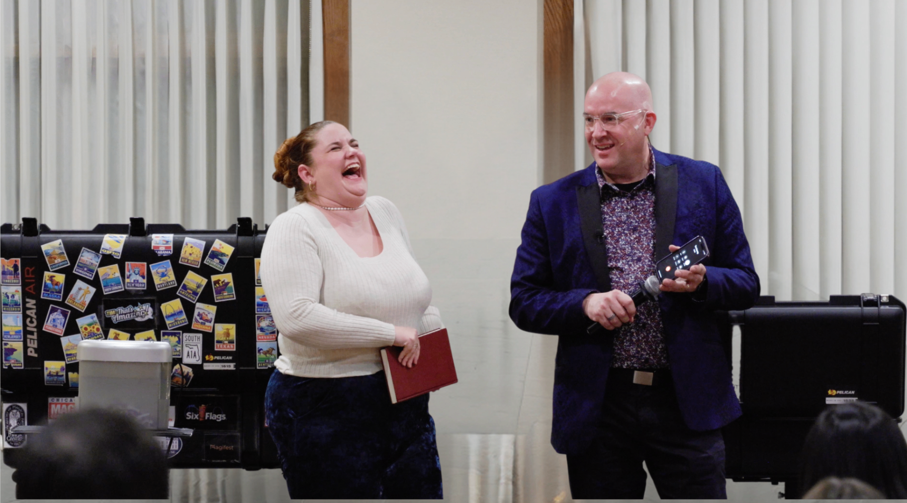 Tim and a lady laughing