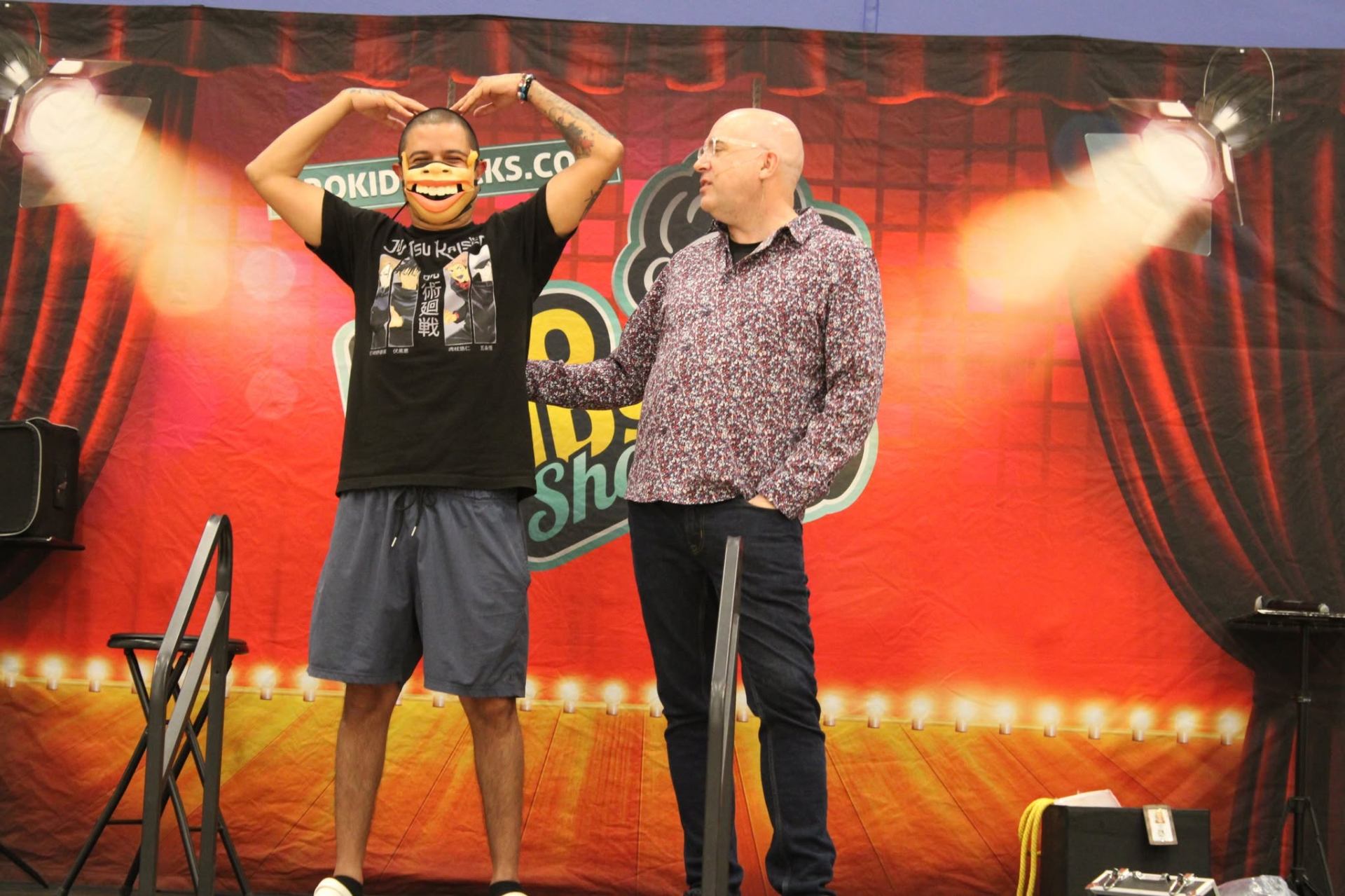 Having fun with a dad on stage